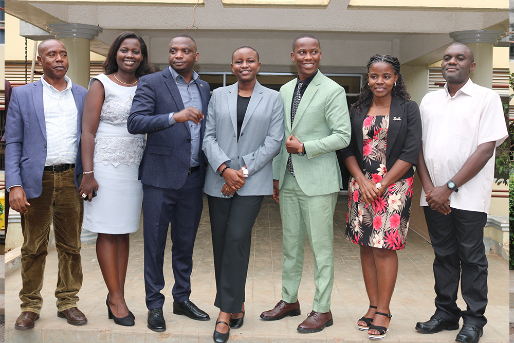 Students who defended posed for a group photo with Centre Director